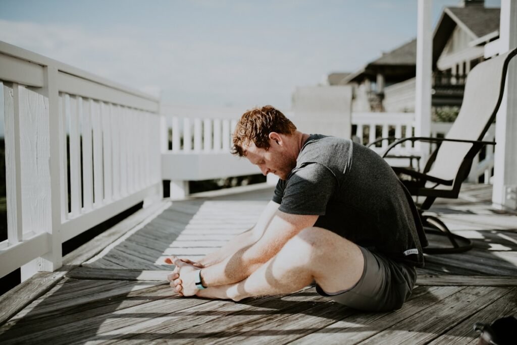 Person doing a gentle cooldown stretch outdoors